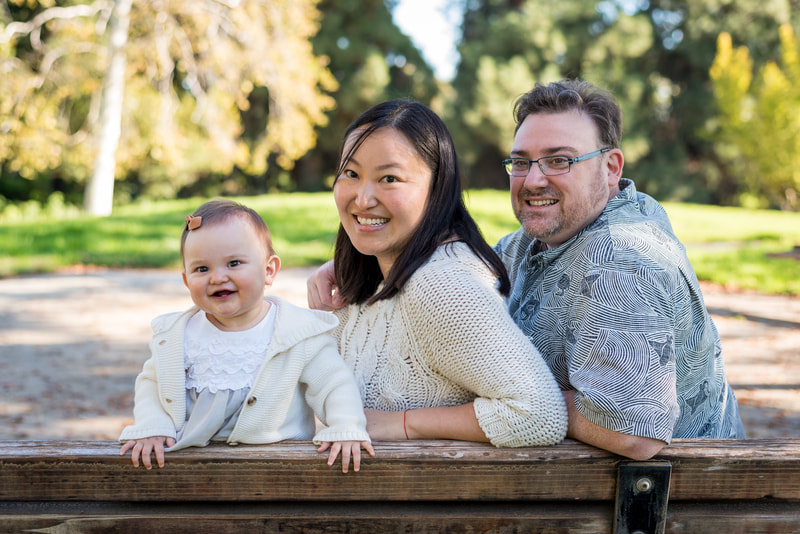 relaxed outdoor family portrait photo with toddler at the UC Davis Arboretum