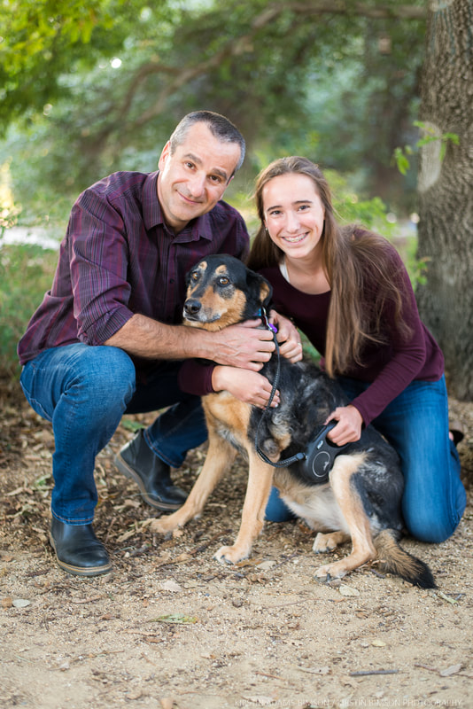 Outdoor family portrait photo with dogs at UC Davis Arboretum