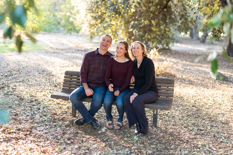 candid outdoor family portrait photo at UC Davis Arboretum