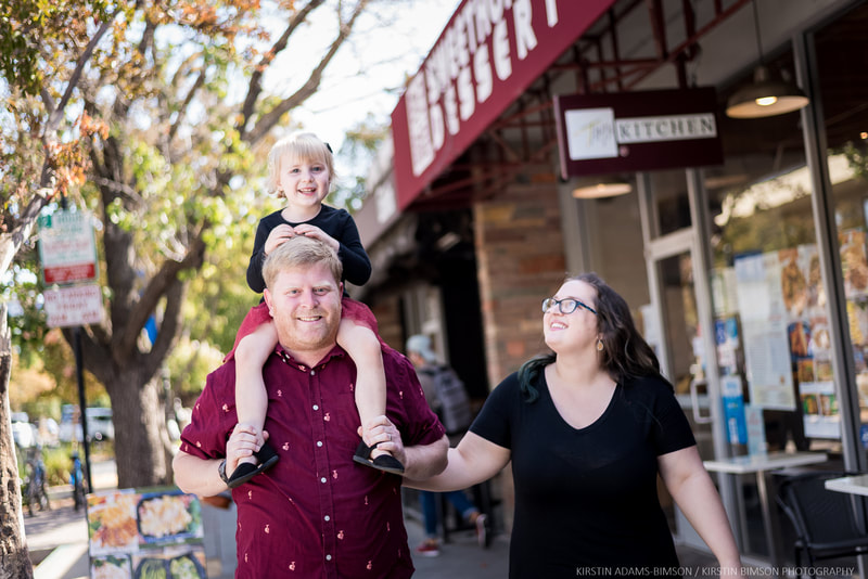 candid outdoor family portrait photo in  in downtown Davis